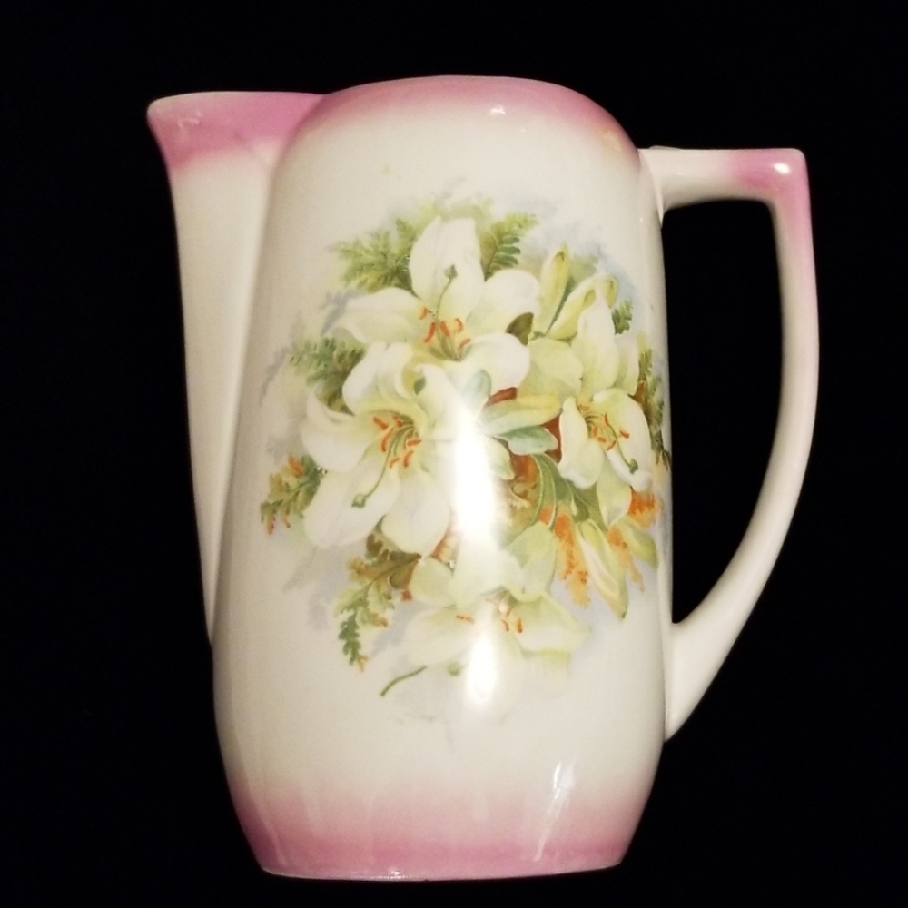Flower and pink luster pitcher